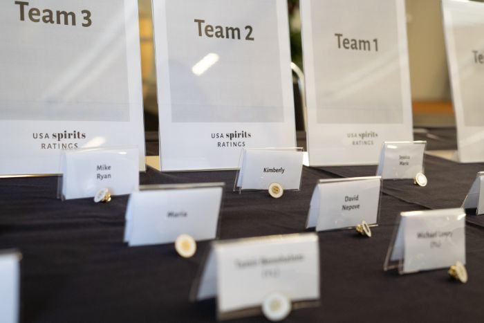 Judges pick their name tags and judging pins as they enter Judges pick their name tags and judging pins as they enter